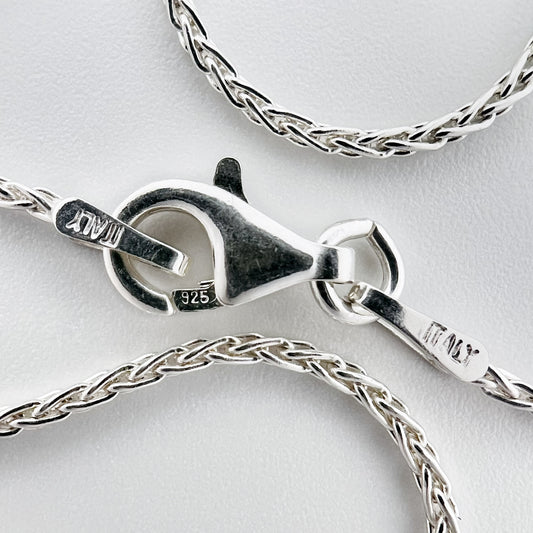 close up of clasp with 925 silver stamp and clear pattern of 1.1 mm rope chain style is visible