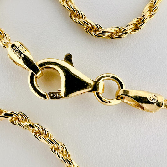 close up of clasp with 925 silver stamp and clear pattern of rope style chain is visible